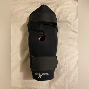 Black hinged Knee Brace by Ortho Active